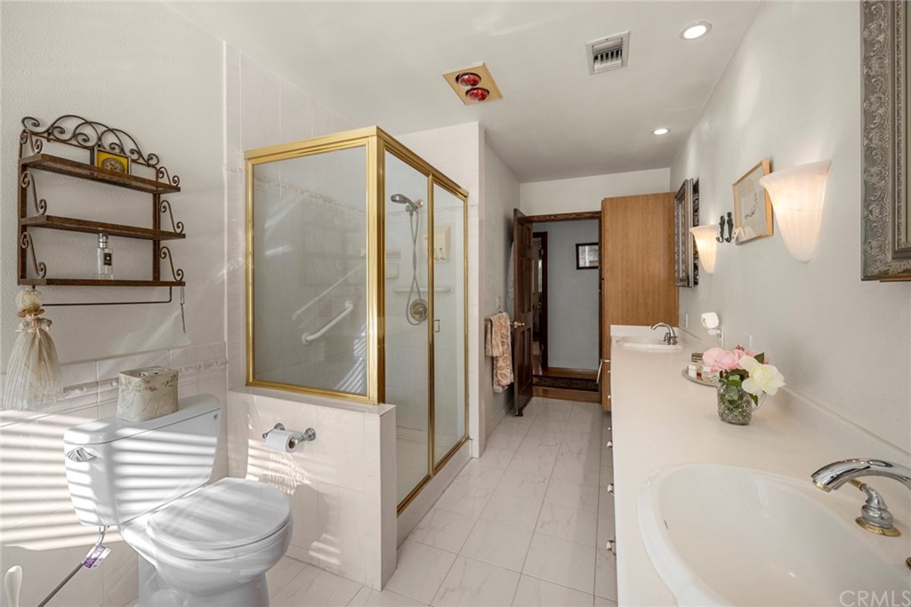 610 Laguna Road Fullerton, CA 92835 - Photo 17 of 29 a bathroom with a bathtub and a shower