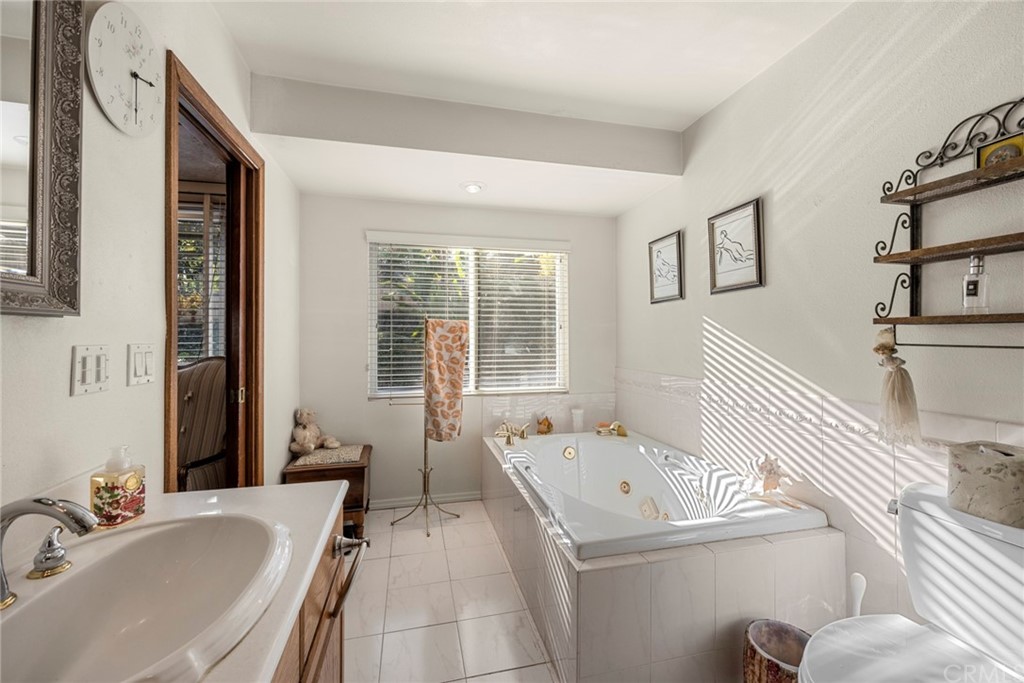 610 Laguna Road Fullerton, CA 92835 - Photo 18 of 29 a bathroom with a sink and a bathtub