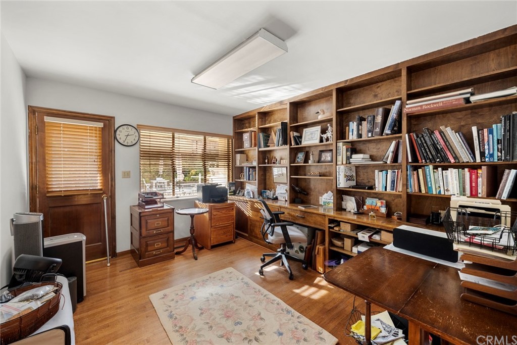 610 Laguna Road Fullerton, CA 92835 - Photo 22 of 29 a view of a livingroom with workspace and a large window