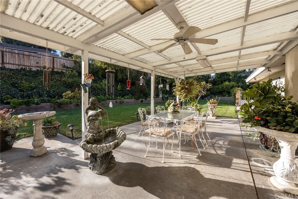 610 Laguna Road Fullerton, CA 92835 - Photo 23 of 29 a view of a patio with a table and chairs and a barbeque