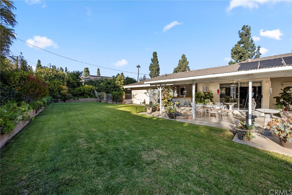 610 Laguna Road Fullerton, CA 92835 - Photo 25 of 29 a view of a house with a yard porch and sitting area