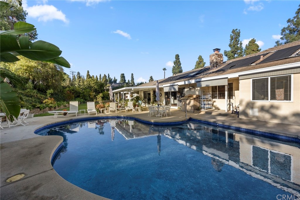 610 Laguna Road Fullerton, CA 92835 - Photo 26 of 29 a view of a swimming pool with a patio