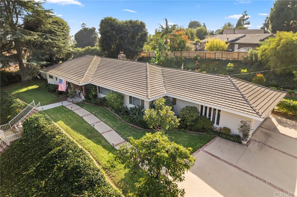 610 Laguna Road Fullerton, CA 92835 - Photo 4 of 29 a view of a house with a yard and furniture