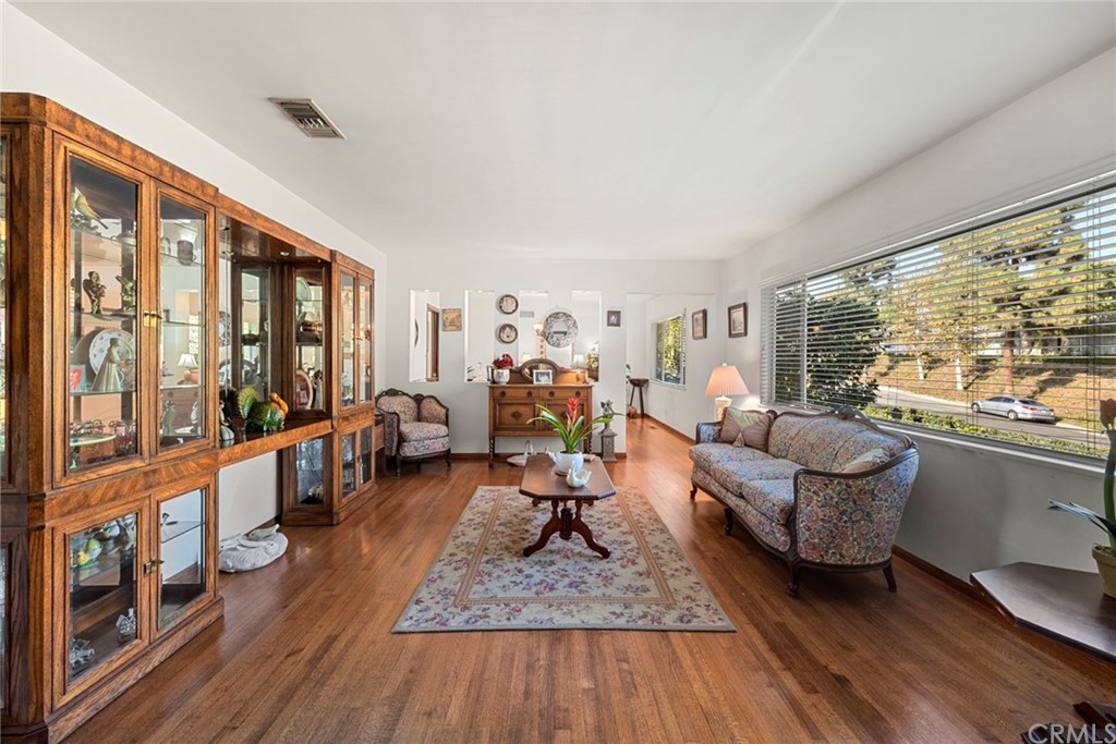 610 Laguna Road Fullerton, CA 92835 - Photo 5 of 29 a living room with furniture and a large window