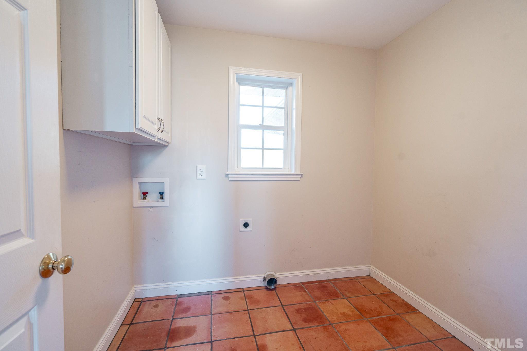 5723 Thom Road Graham, NC 27253 - Photo 13 of 57 Laundry with Cabinets and Pull down stairs to attic in ceiling