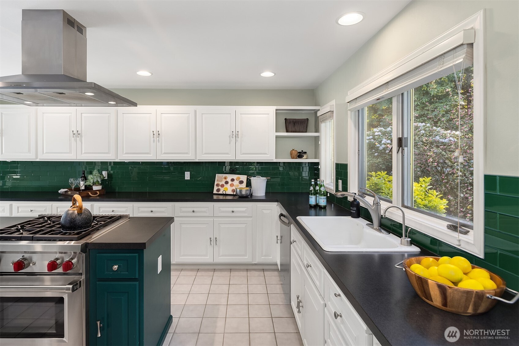 16309 110th Avenue Northeast Bothell, WA 98011 - Photo 11 of 38 a kitchen with a sink stove and cabinets