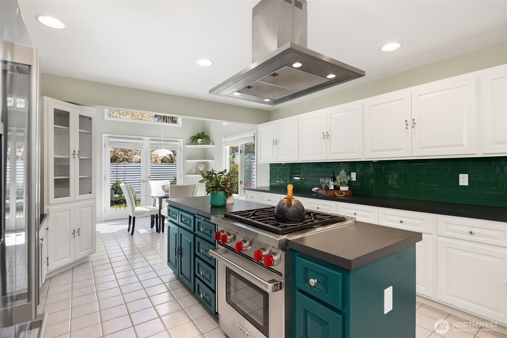 16309 110th Avenue Northeast Bothell, WA 98011 - Photo 12 of 38 a kitchen with stainless steel appliances a stove a sink and a refrigerator