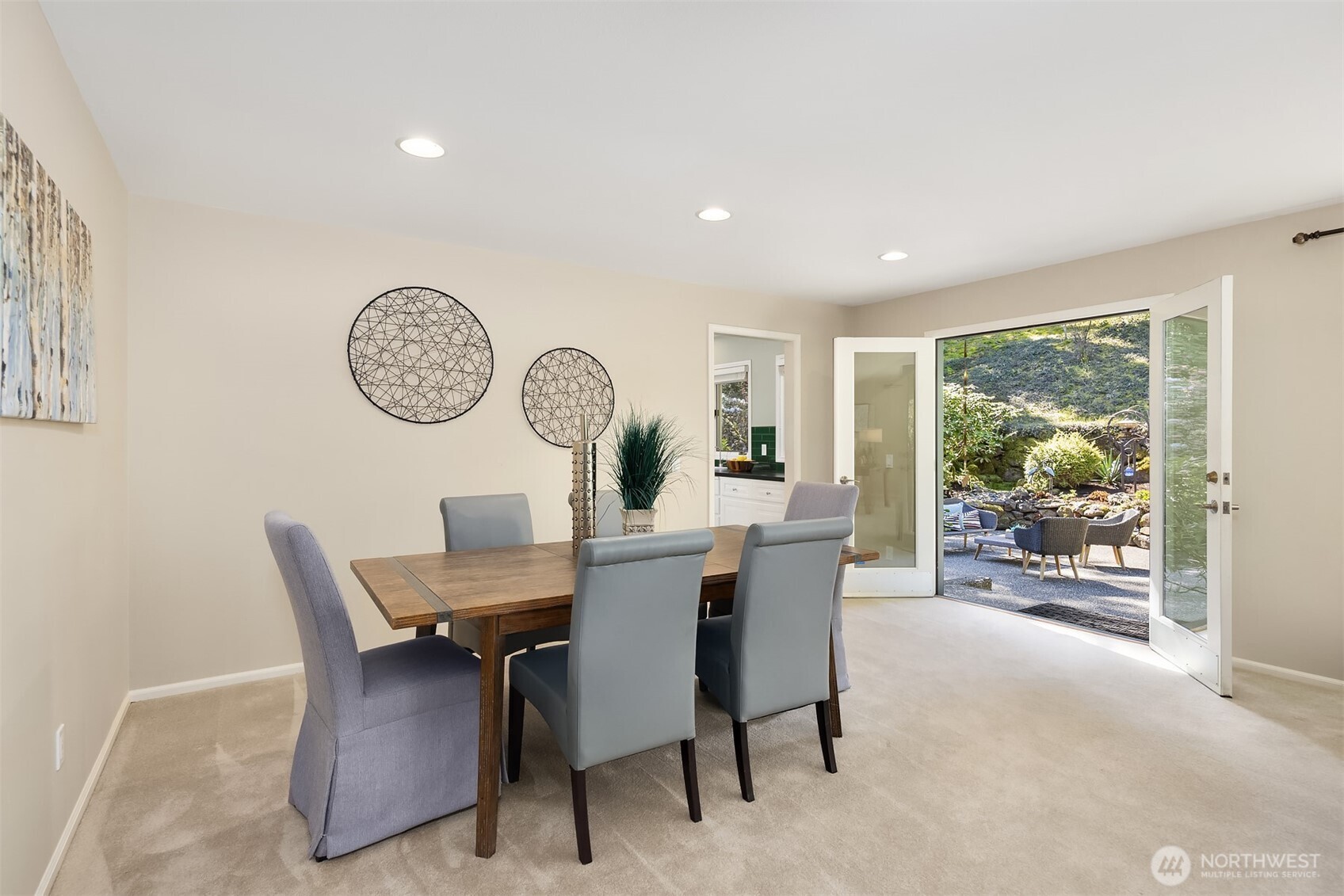 16309 110th Avenue Northeast Bothell, WA 98011 - Photo 16 of 38 a view of a dining room and a table and chairs