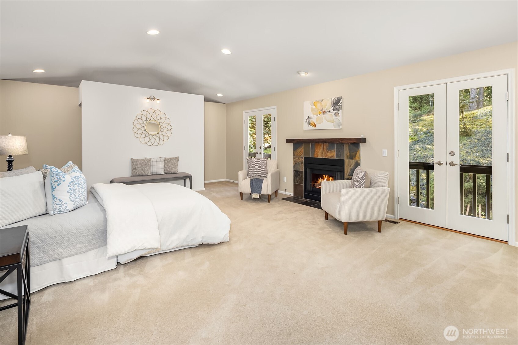 16309 110th Avenue Northeast Bothell, WA 98011 - Photo 20 of 38 a bed room with a bed and a fireplace