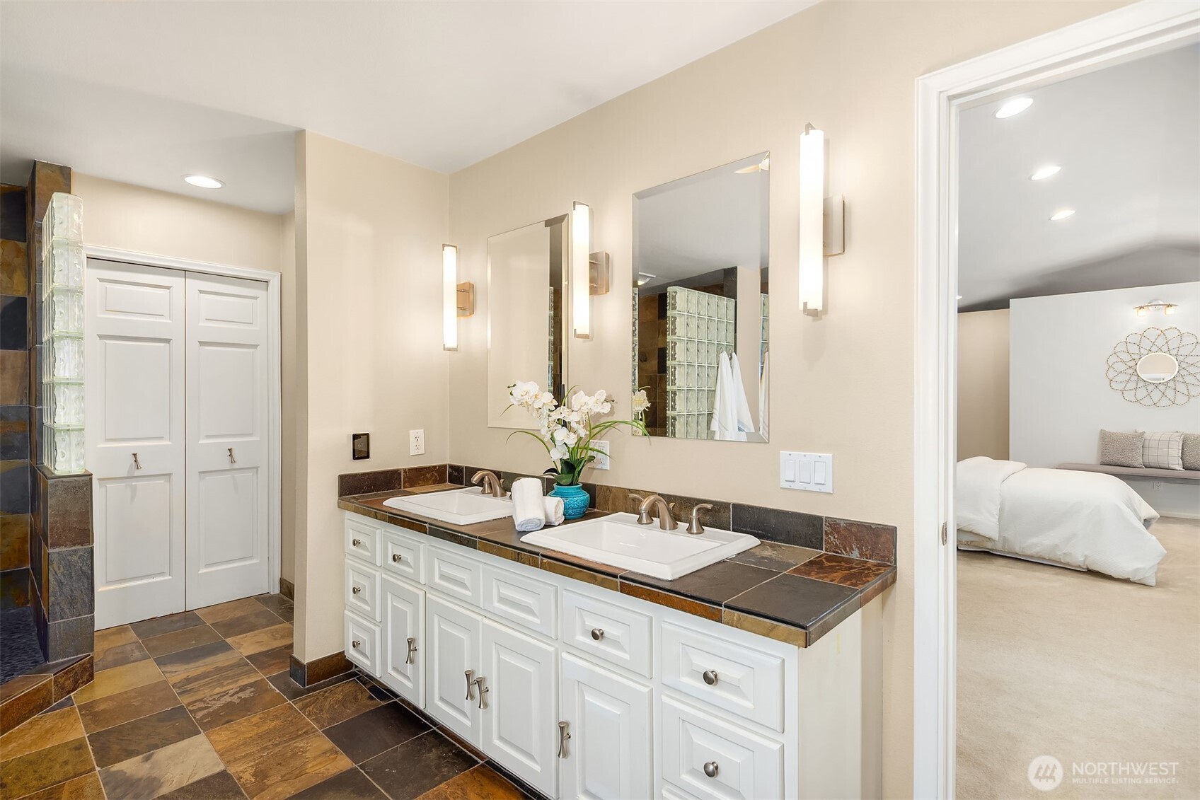 16309 110th Avenue Northeast Bothell, WA 98011 - Photo 22 of 38 a bathroom with a sink and a mirror