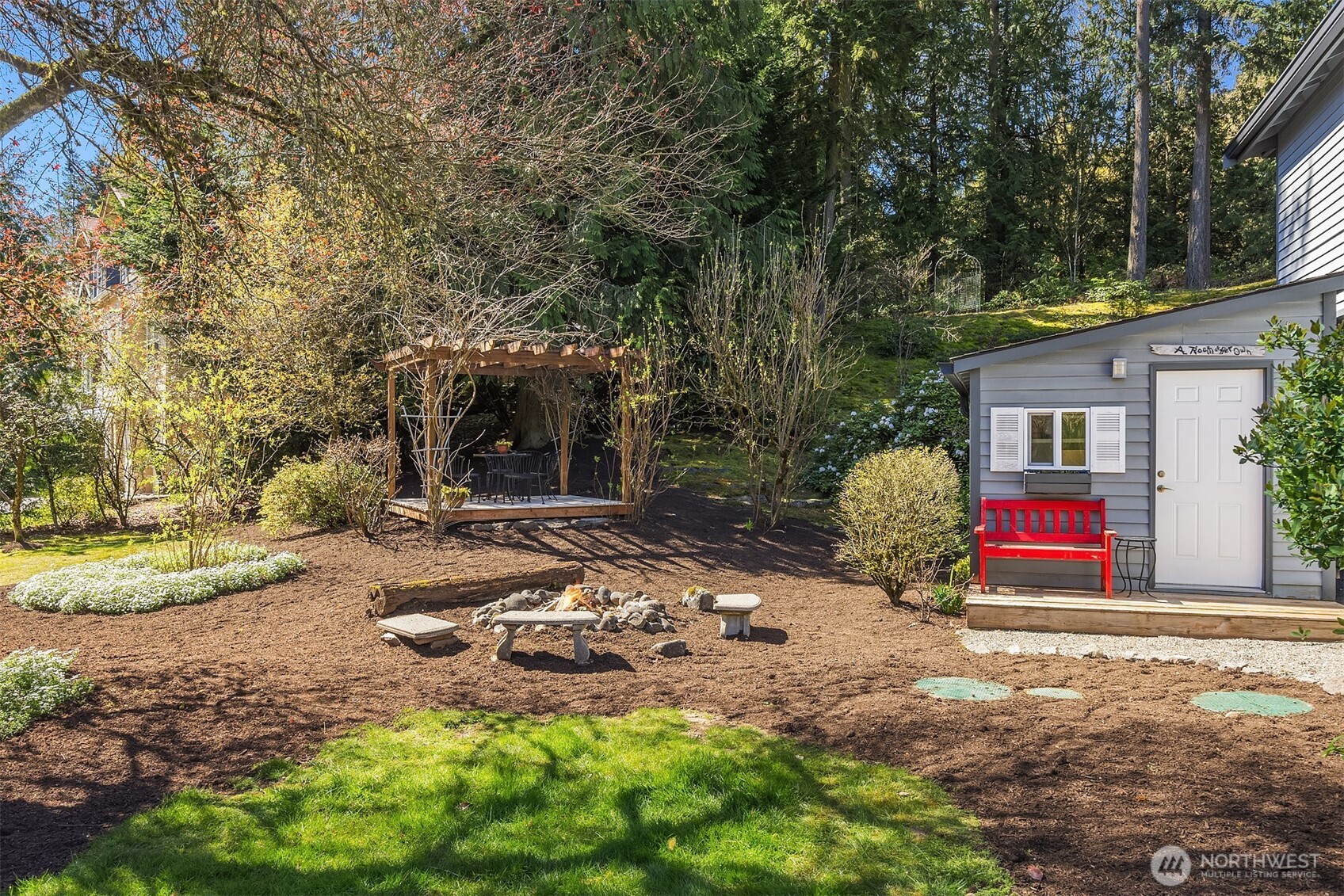 16309 110th Avenue Northeast Bothell, WA 98011 - Photo 30 of 38 front view of house with swing and sign board
