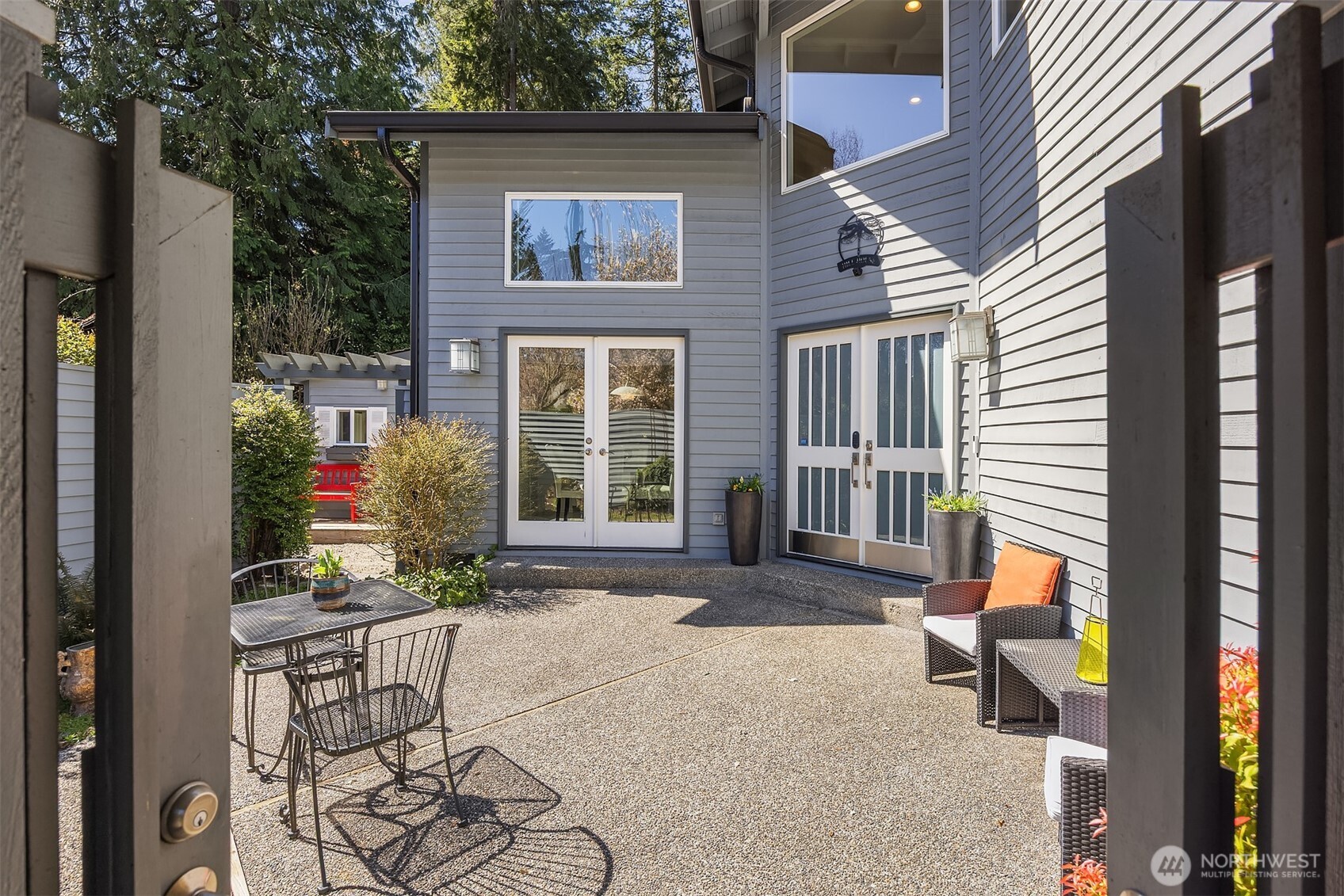 16309 110th Avenue Northeast Bothell, WA 98011 - Photo 3 of 38 a backyard of a house with outdoor seating