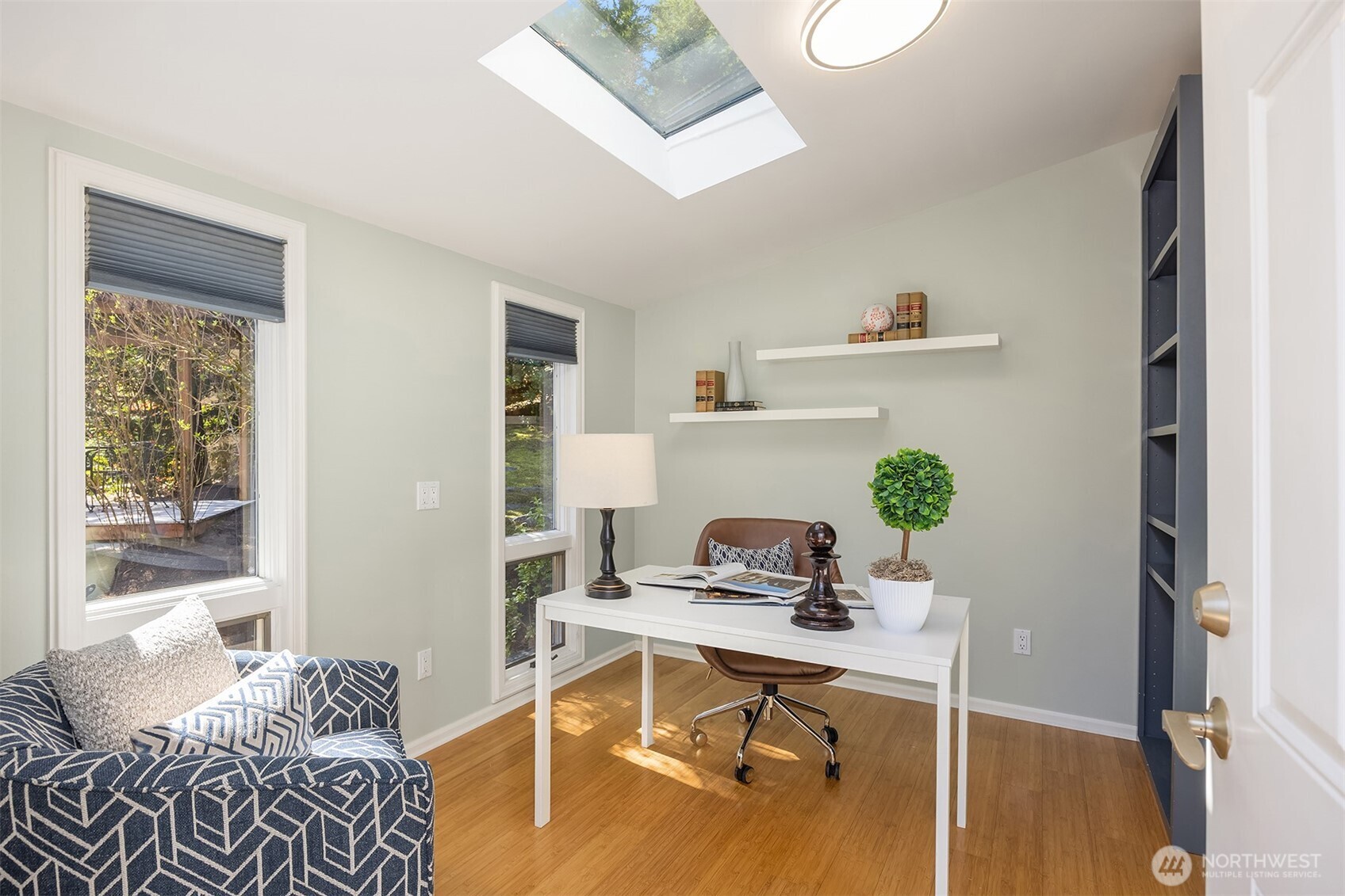 16309 110th Avenue Northeast Bothell, WA 98011 - Photo 32 of 38 a view of a workspace with furniture and a window
