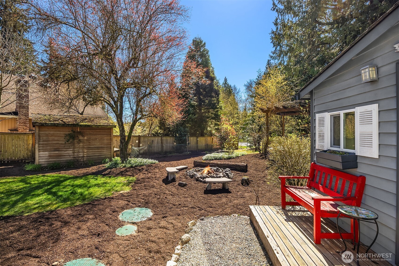16309 110th Avenue Northeast Bothell, WA 98011 - Photo 33 of 38 a view of a backyard with sitting area