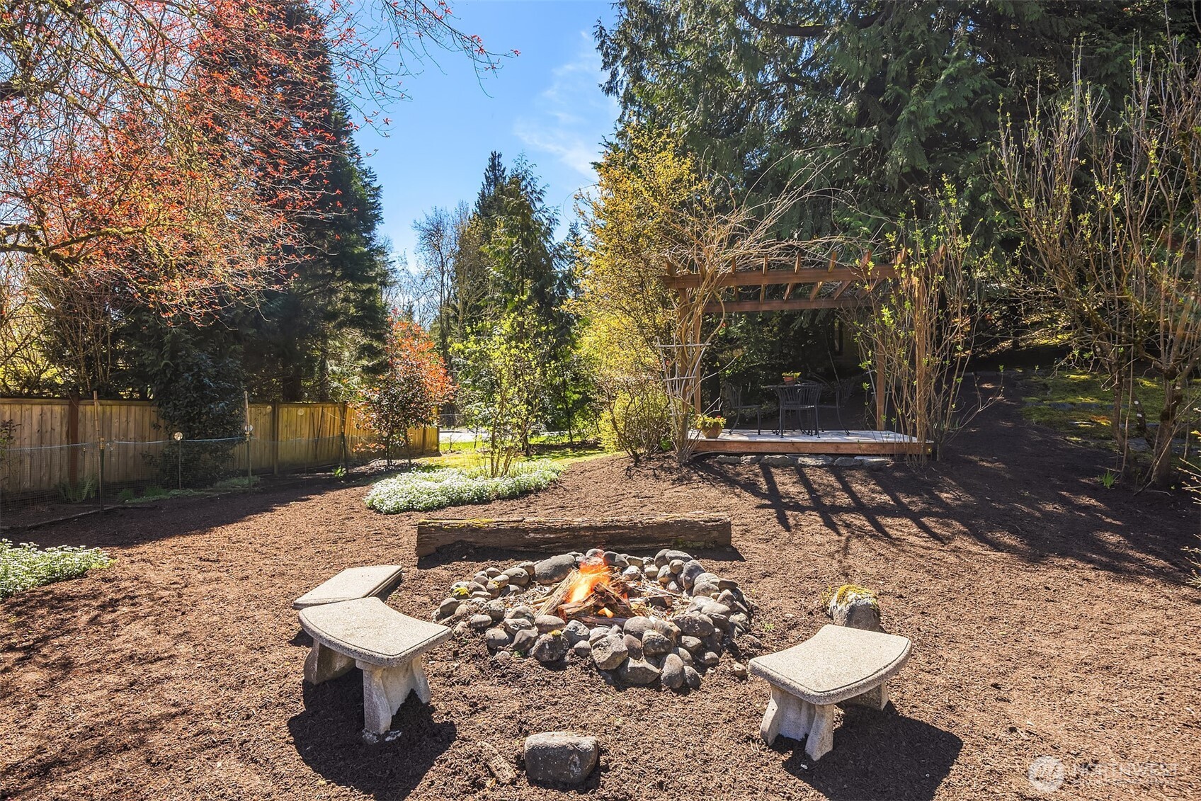 16309 110th Avenue Northeast Bothell, WA 98011 - Photo 38 of 38 a view of a backyard with table and chairs and plants