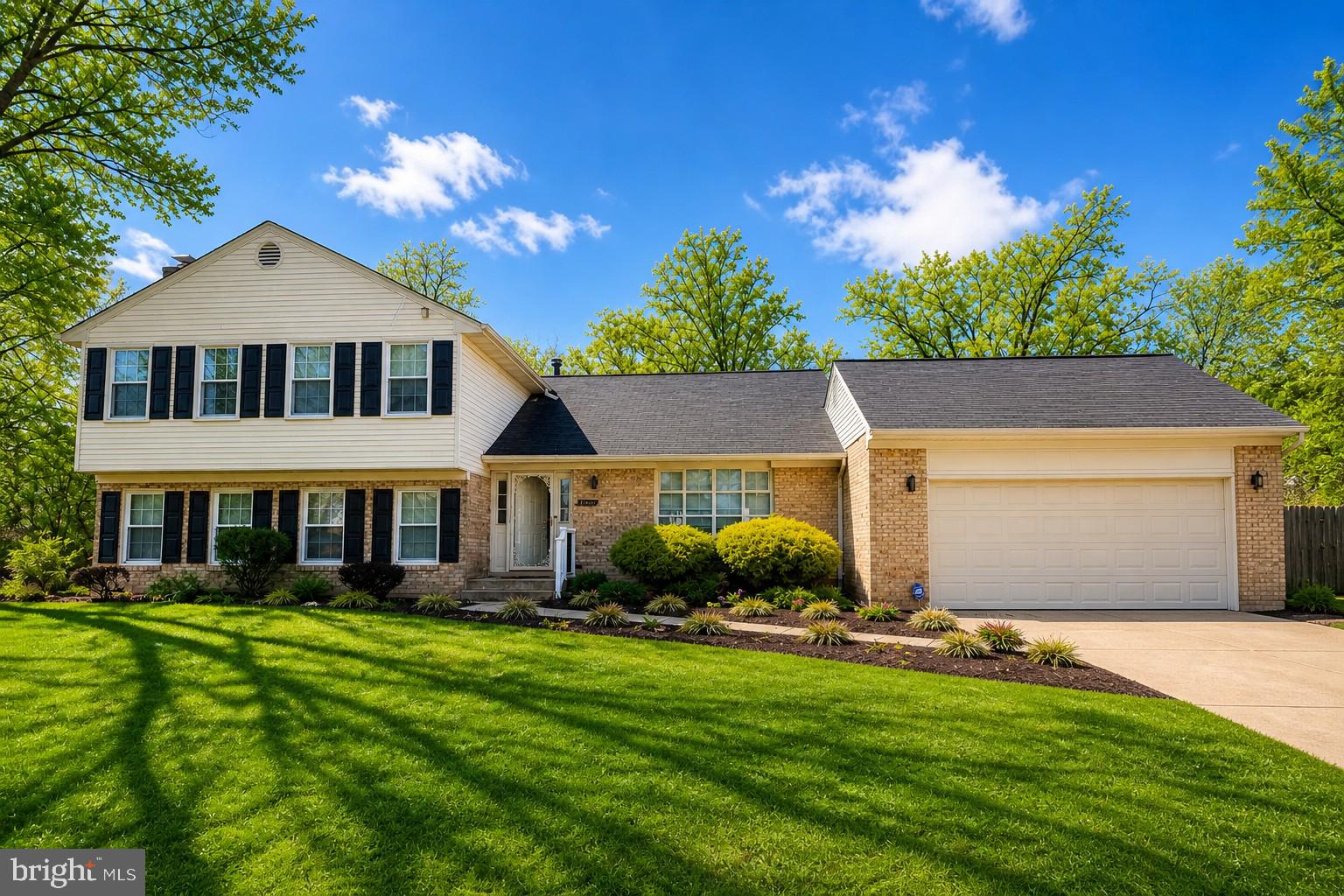 Charming home with lush greenery.