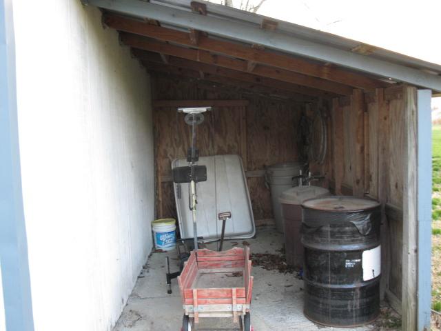 882 Panhandle Road Manchester, TN 37355 - Photo 11 of 16 Lean too off the side of the workshop for more storage!!!