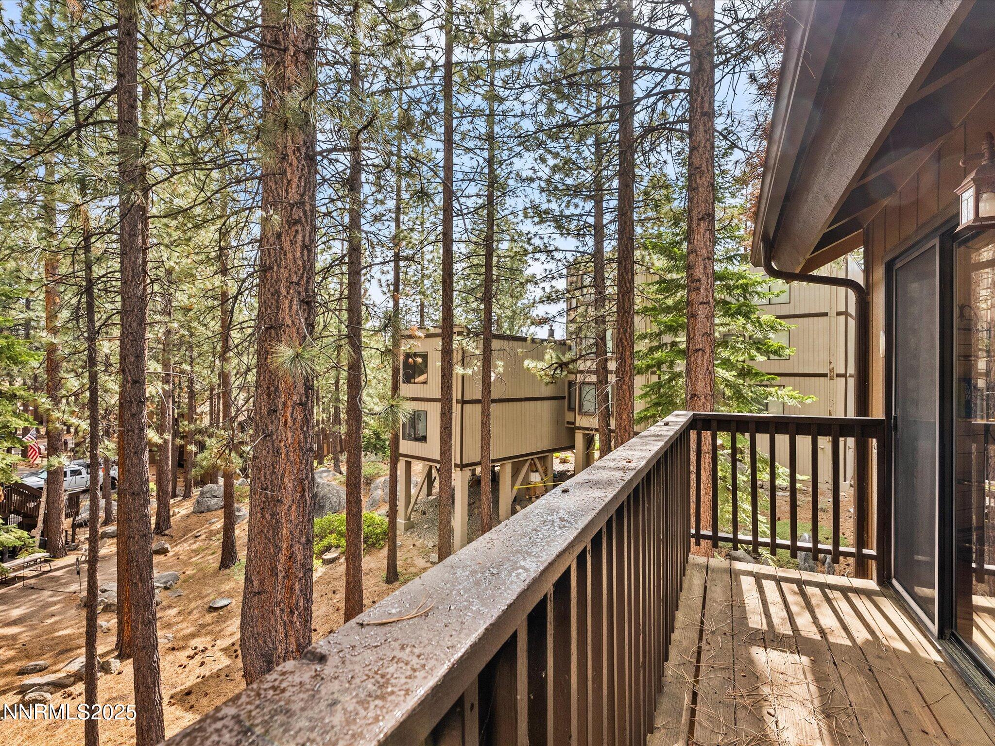 178 Tahoma Circle, Unit B Stateline, NV 89449 - Photo 15 of 52 a view of balcony with wooden floor and fence