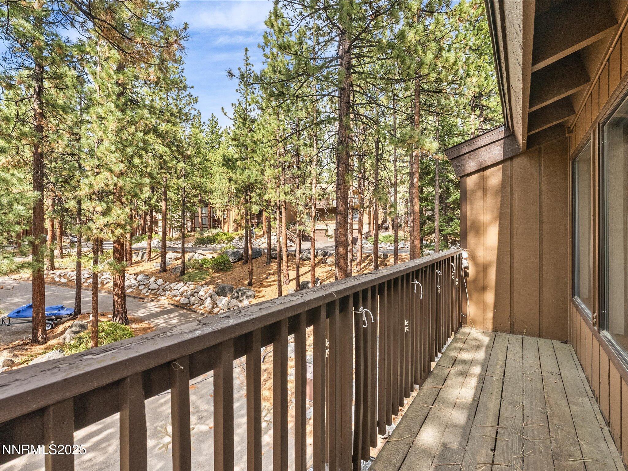 178 Tahoma Circle, Unit B Stateline, NV 89449 - Photo 16 of 52 a view of balcony with wooden floor and fence