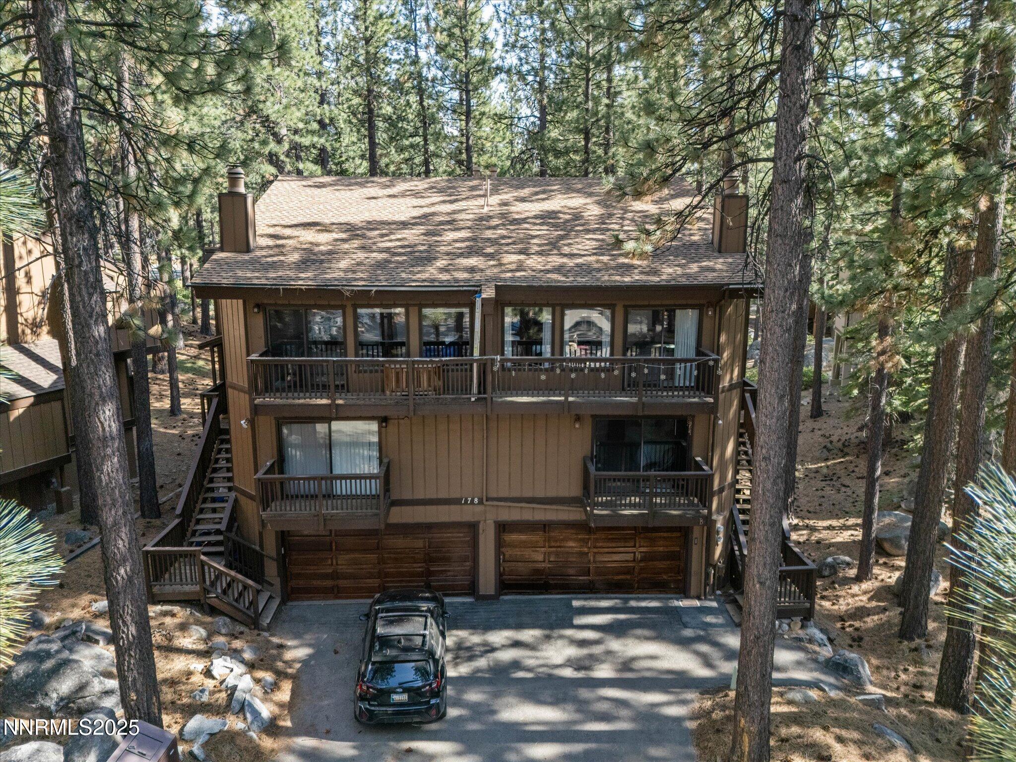 178 Tahoma Circle, Unit B Stateline, NV 89449 - Photo 34 of 52 a view of a house with a small yard