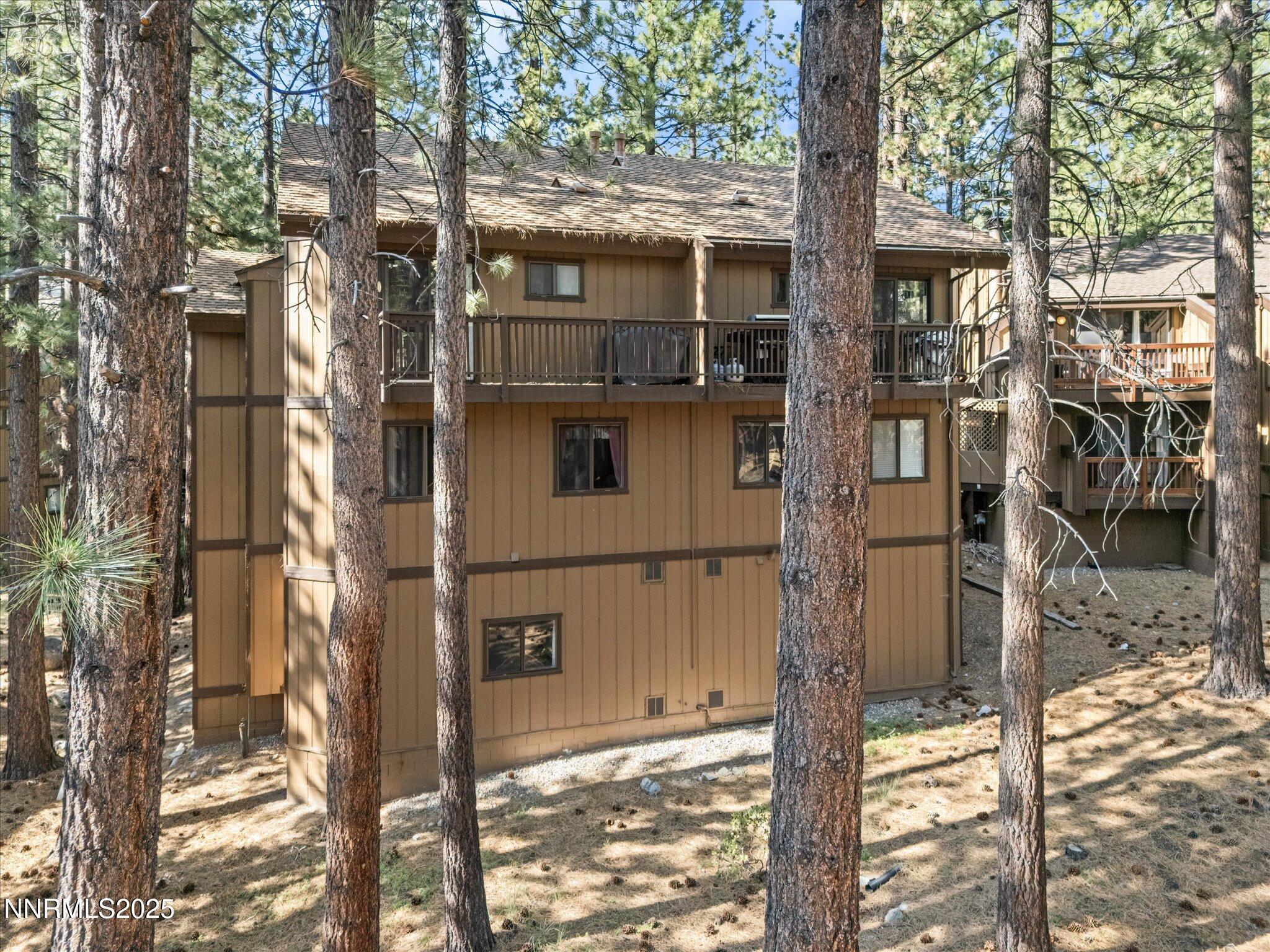178 Tahoma Circle, Unit B Stateline, NV 89449 - Photo 37 of 52 a view of a house with a tree