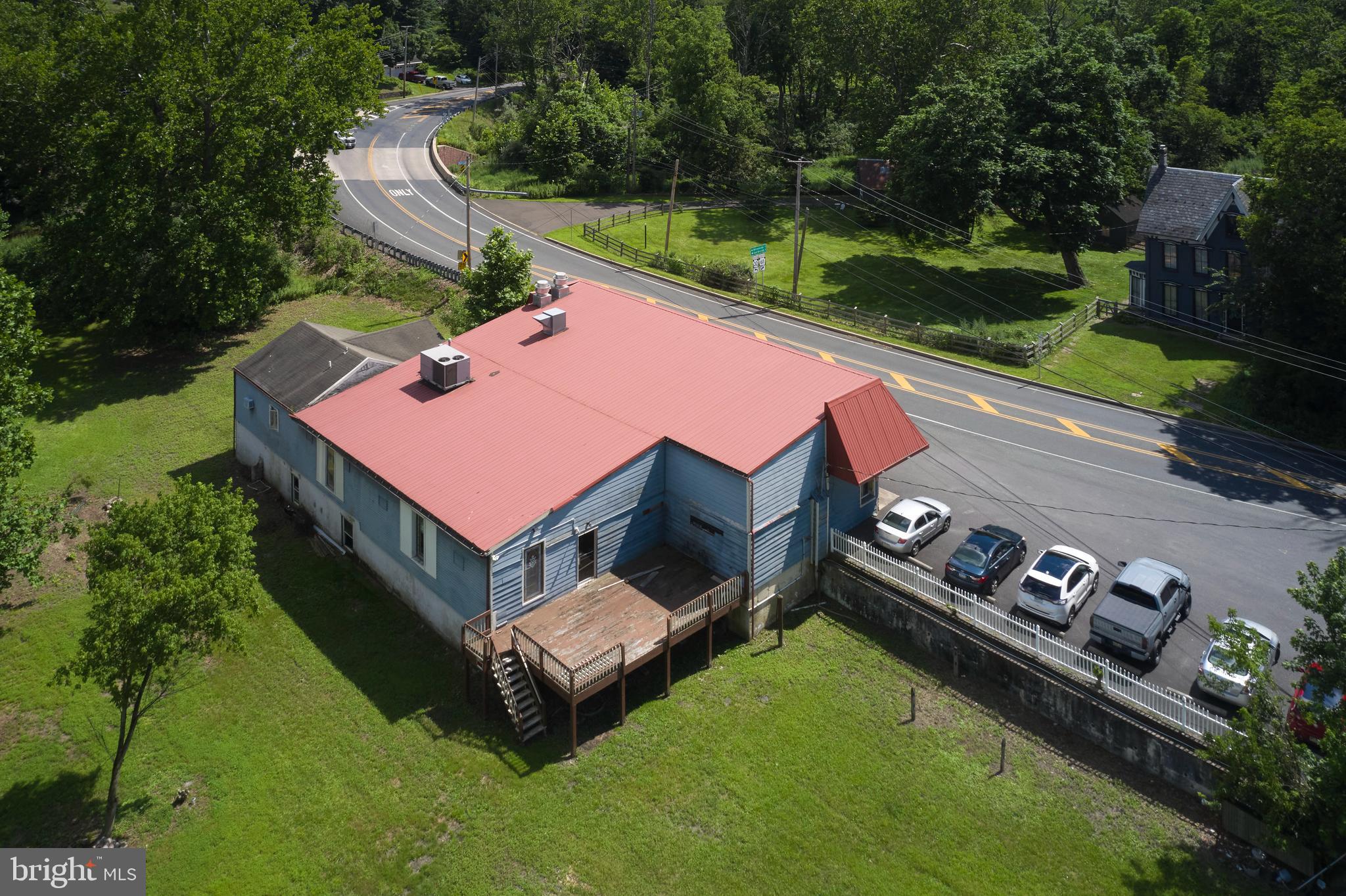 9755 Easton Road Upper Black Eddy, PA 18972 - Photo 3 of 11 an aerial view of a house with garden space and street view