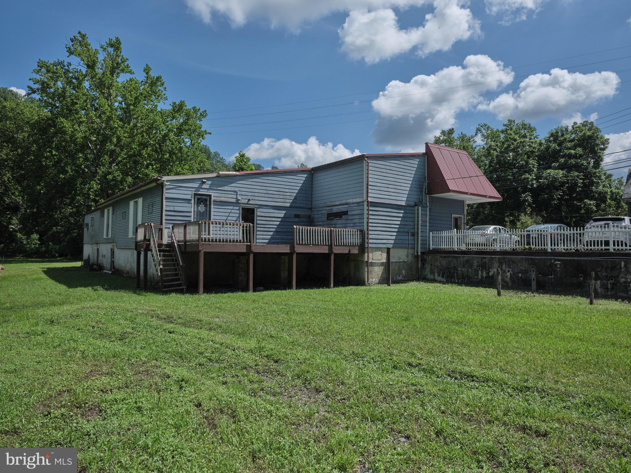 9755 Easton Road Upper Black Eddy, PA 18972 - Photo 4 of 11 a view of a yard in front of a house