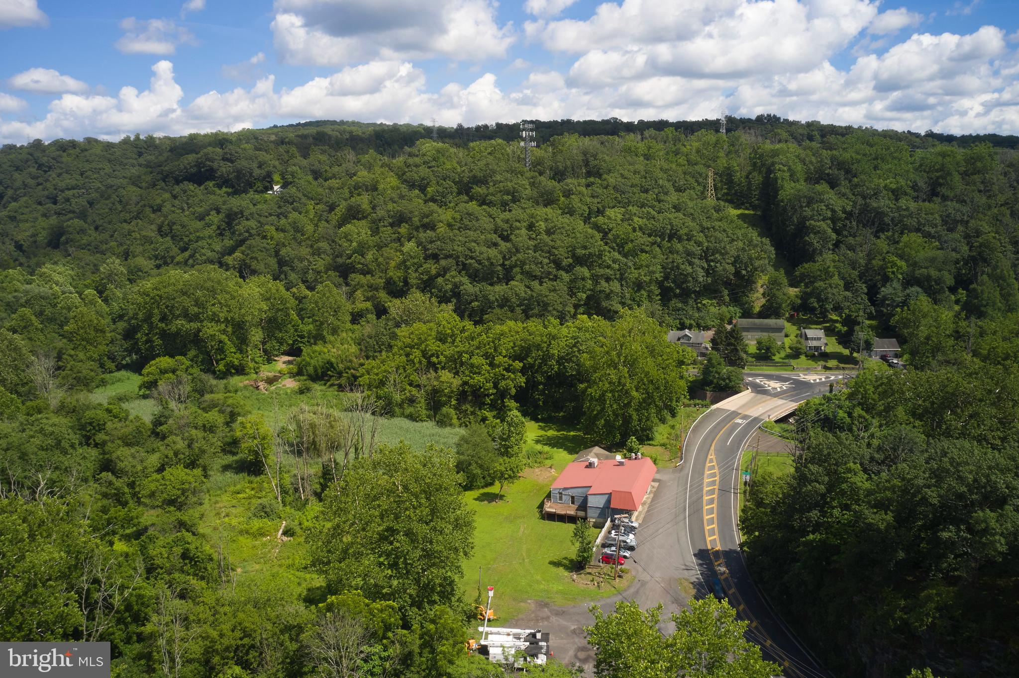 9755 Easton Road Upper Black Eddy, PA 18972 - Photo 9 of 11 an aerial view of a house with mountain view