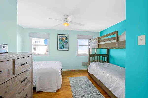 a view of a swimming pool and an outdoor seating