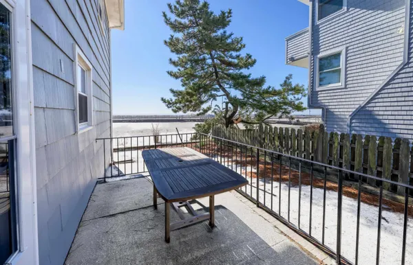 a view of a house with a yard and tree s