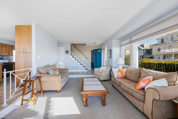 a view of a balcony with wooden floor