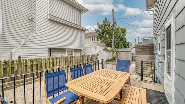 a kitchen with stainless steel appliances granite countertop sink stove and refrigerator