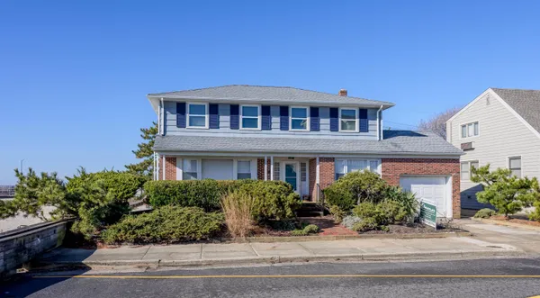 a view of a balcony with wooden floor