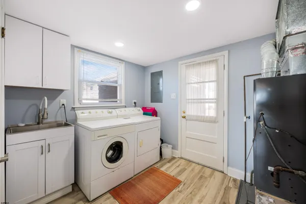 a bedroom with a bed and a chair