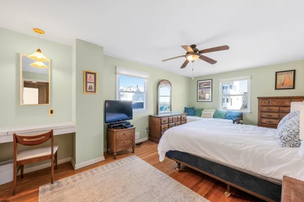 a bed room with bed and window