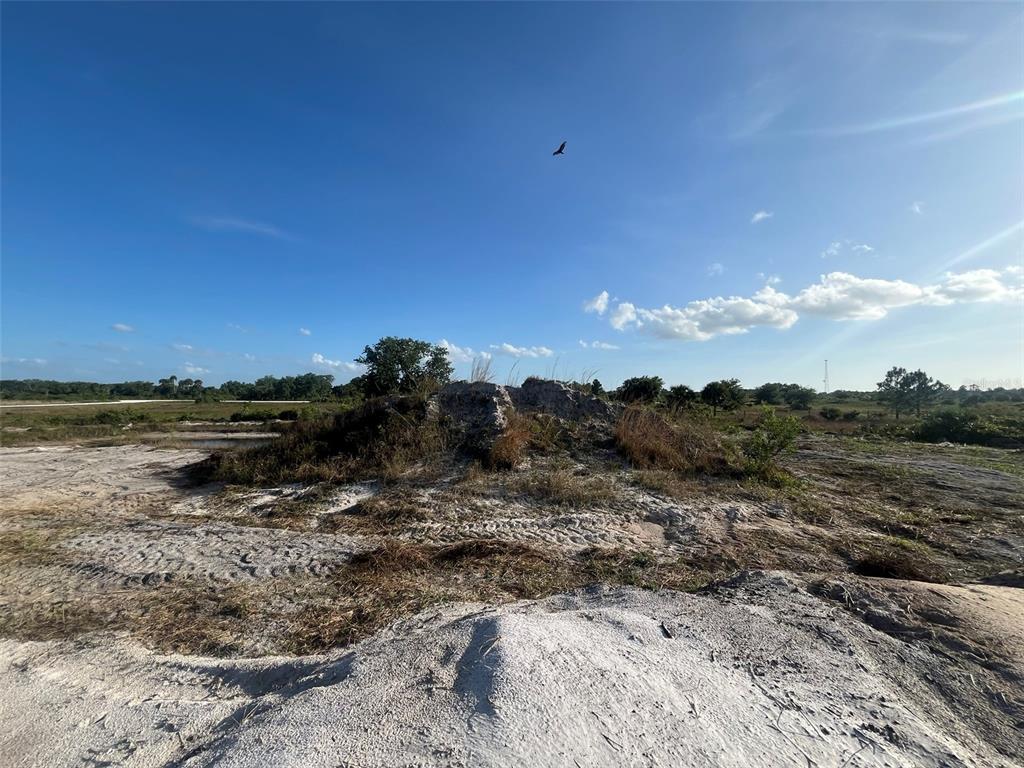16058 290th Street Okeechobee, FL 34972 - Photo 8 of 16 a view of a lake with mountain