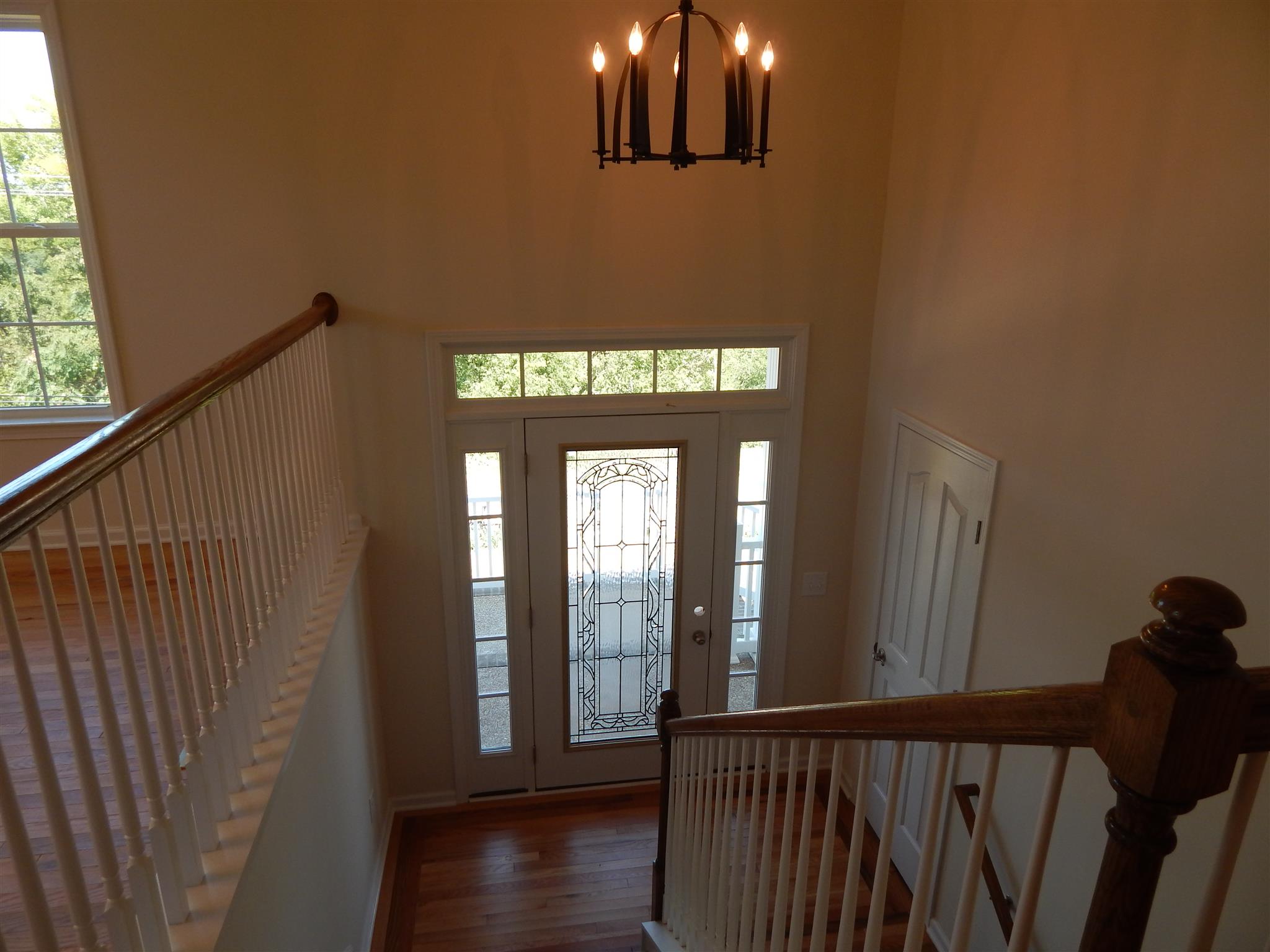1545 Heller Ridge Spring Hill, TN 37174 - Photo 2 of 19 a view of a hallway from a balcony