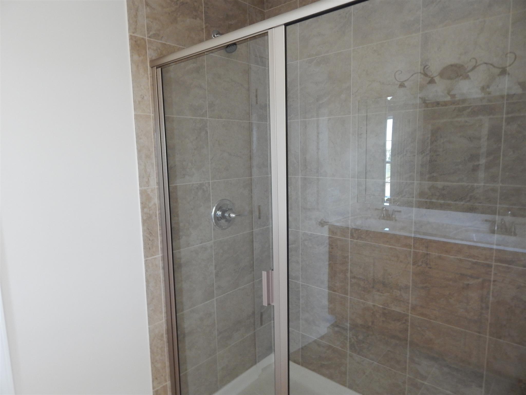1545 Heller Ridge Spring Hill, TN 37174 - Photo 9 of 19 a bathroom with a shower