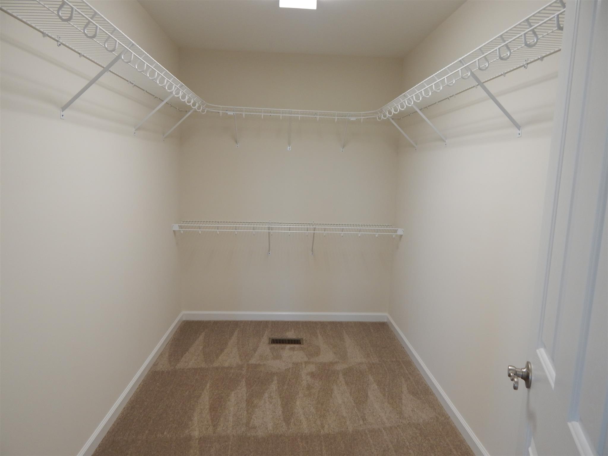 1545 Heller Ridge Spring Hill, TN 37174 - Photo 10 of 19 a view of a room with racks on the wall