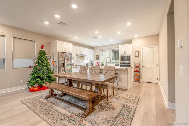 a kitchen with stainless steel appliances granite countertop a sink and cabinets