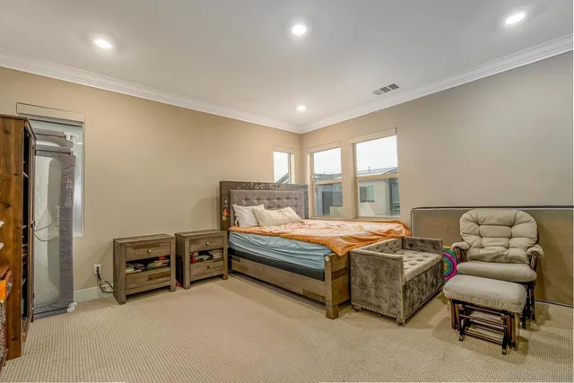 a bathroom with a double vanity sink mirror and shower