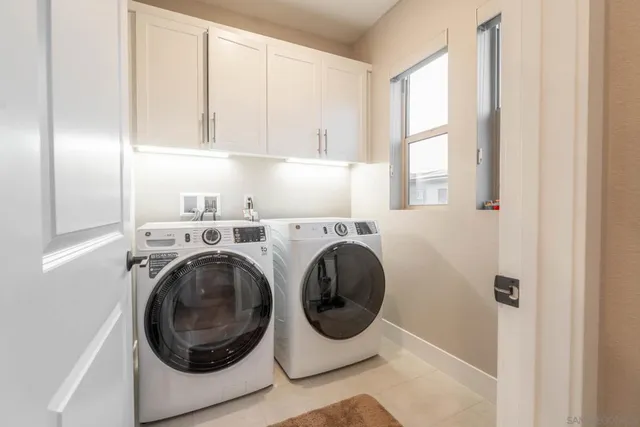 a balcony with furniture and a potted plant