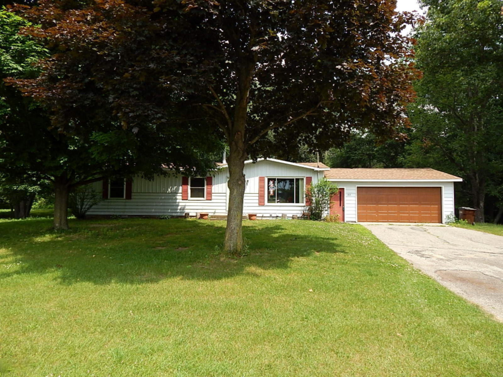 165 11 Mile Road Northwest Sparta, MI 49345 - Photo 1 of 19 Front
