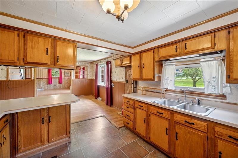 789 Mahoning Road Templeton, PA 16259 - Photo 17 of 41 a large kitchen with stainless steel appliances granite countertop a sink and a large window