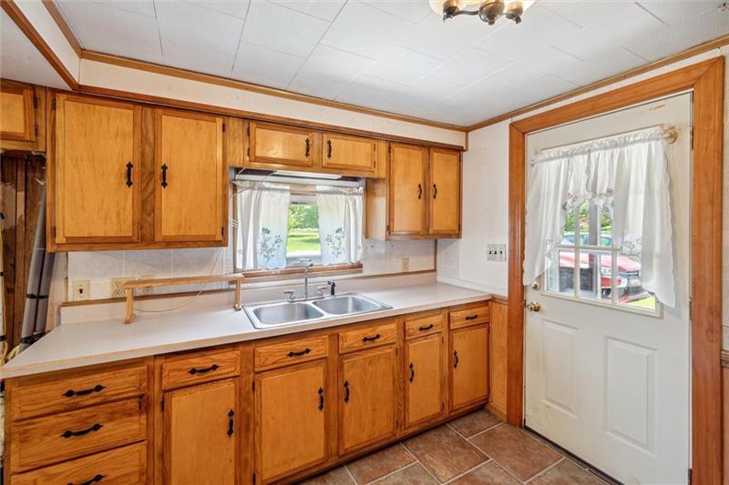 789 Mahoning Road Templeton, PA 16259 - Photo 20 of 41 a kitchen with a sink and a window