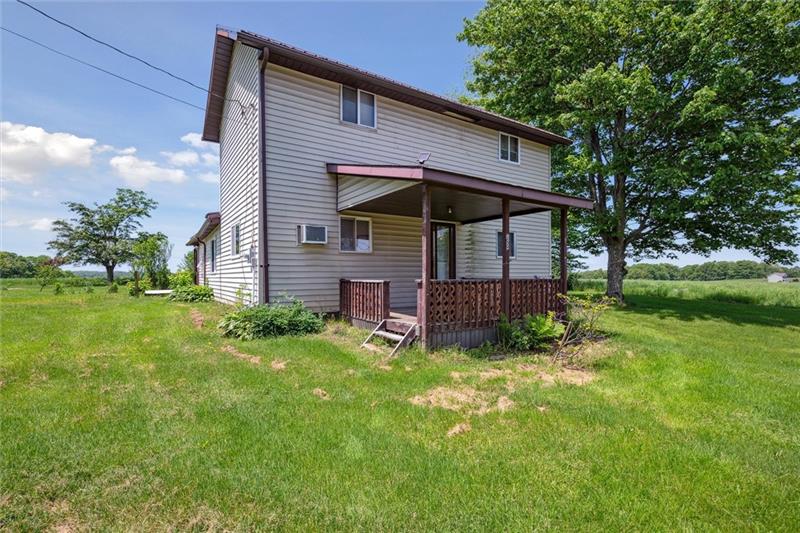 789 Mahoning Road Templeton, PA 16259 - Photo 2 of 41 a view of a house with a yard and sitting area