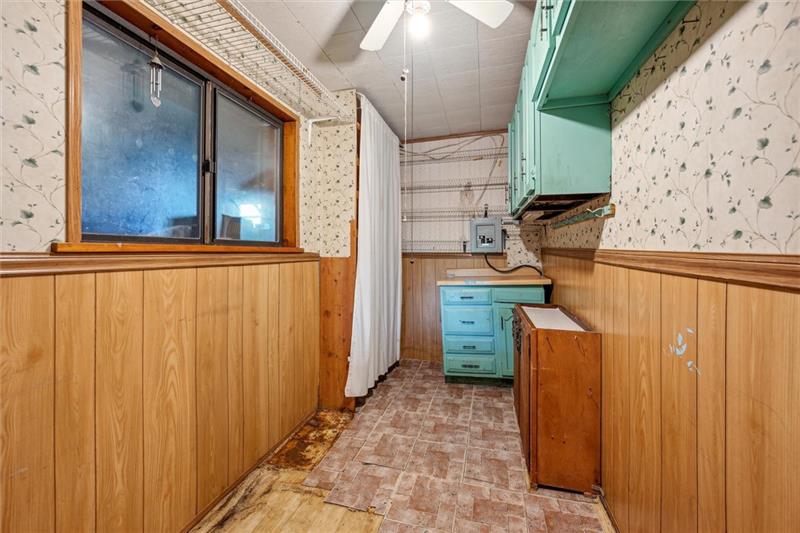 789 Mahoning Road Templeton, PA 16259 - Photo 23 of 41 a view of a storage and utility room with a window