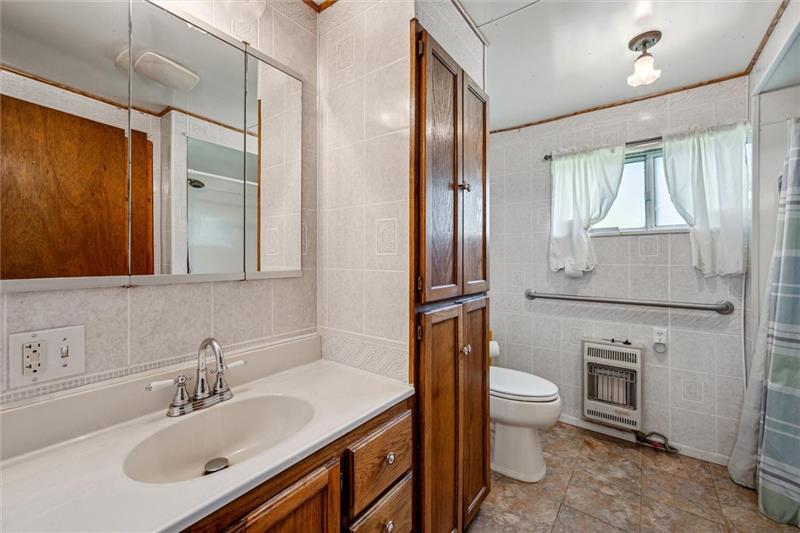 789 Mahoning Road Templeton, PA 16259 - Photo 27 of 41 a bathroom with a sink toilet and shower