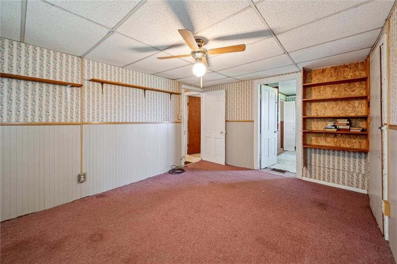 789 Mahoning Road Templeton, PA 16259 - Photo 30 of 41 a view of a livingroom with a ceiling fan and window