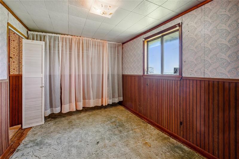 789 Mahoning Road Templeton, PA 16259 - Photo 31 of 41 a view of an empty room with a window